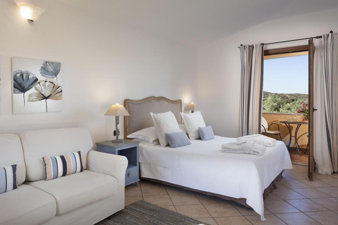 Relais Fenicottero Rosa Pensionat Porto Taverna Eksteriør billede