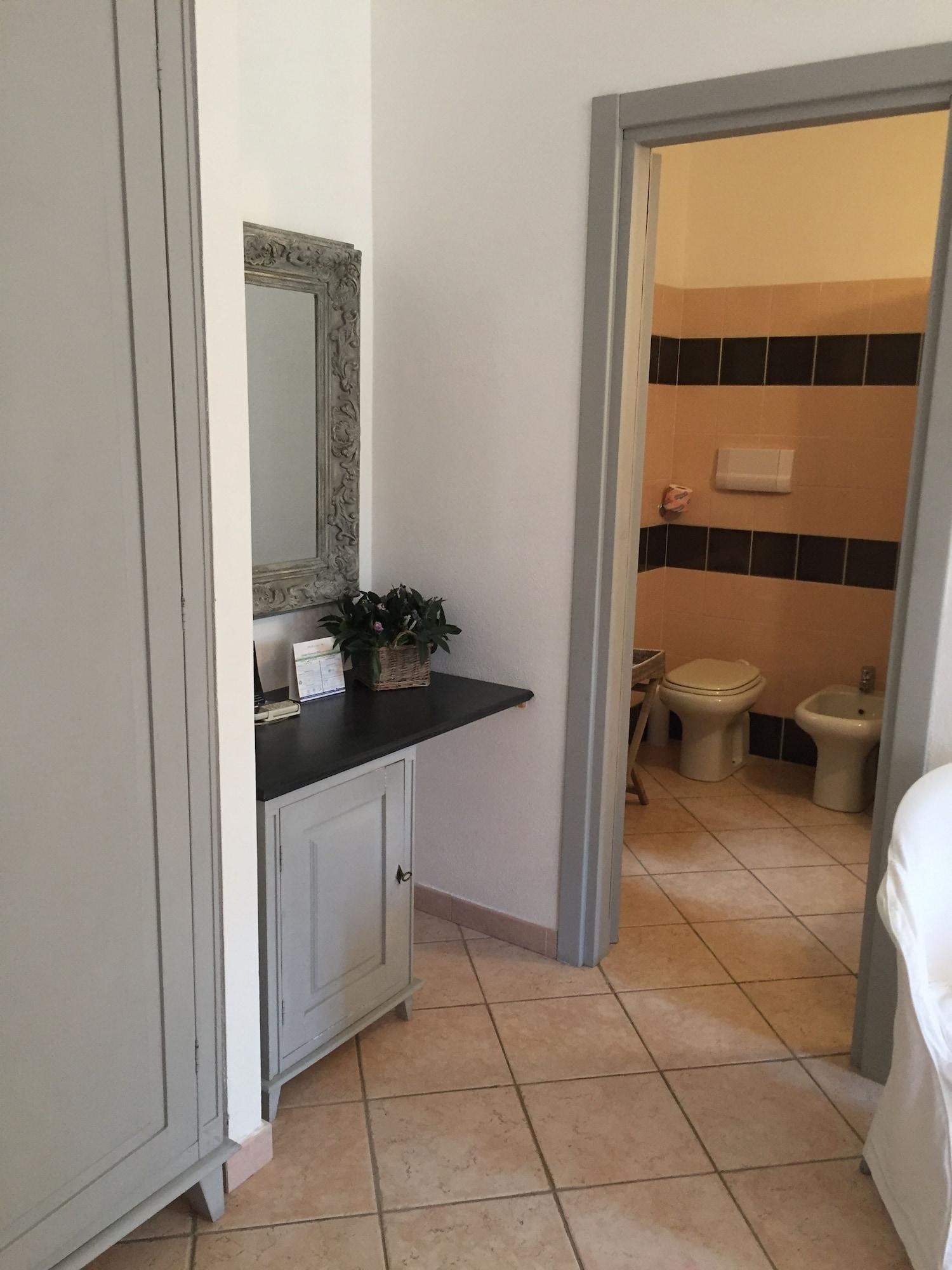 Relais Fenicottero Rosa Pensionat Porto Taverna Eksteriør billede