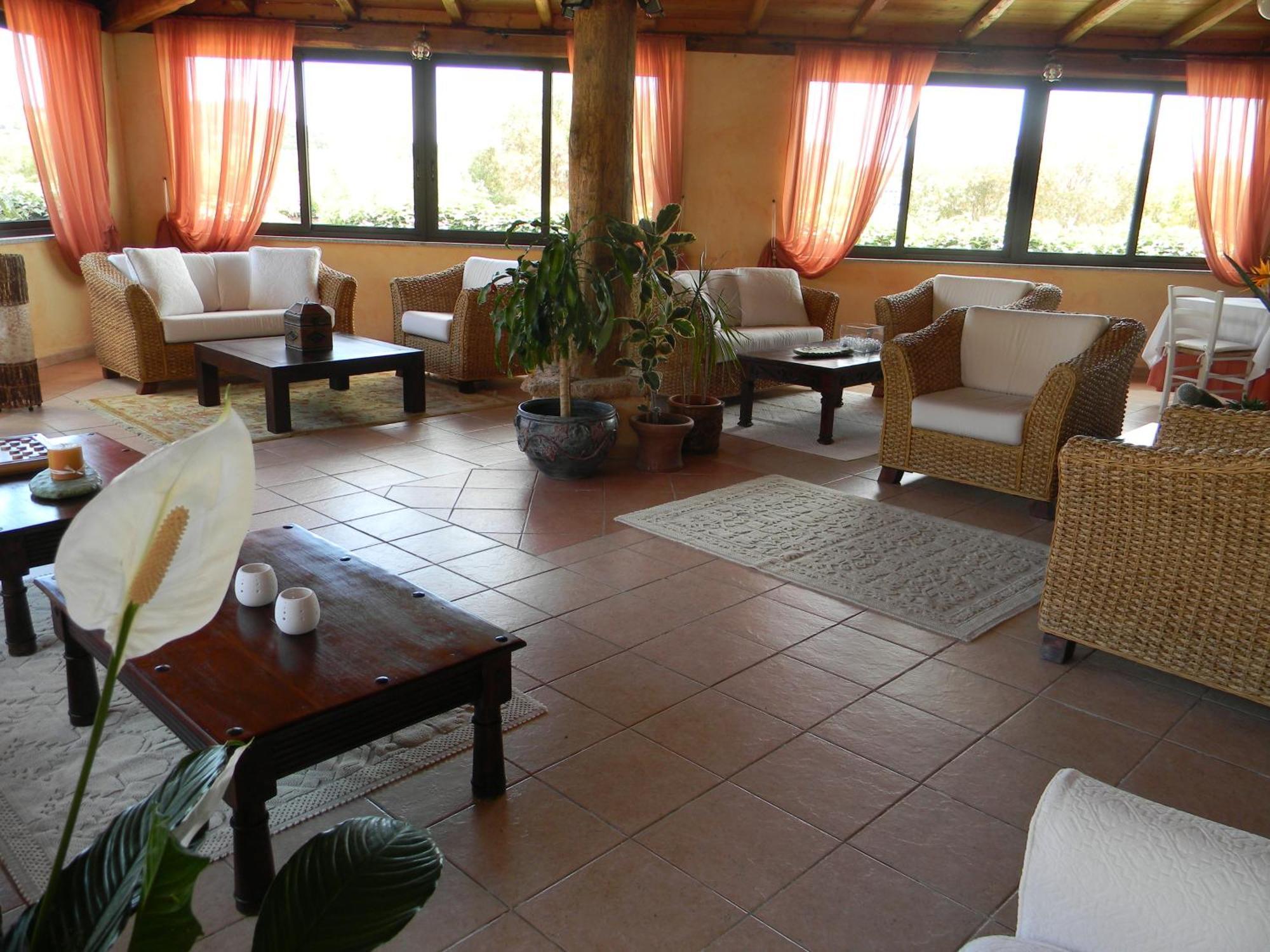 Relais Fenicottero Rosa Pensionat Porto Taverna Eksteriør billede