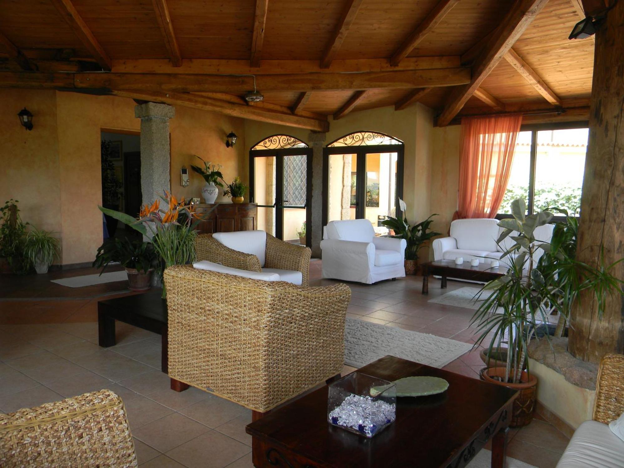 Relais Fenicottero Rosa Pensionat Porto Taverna Eksteriør billede