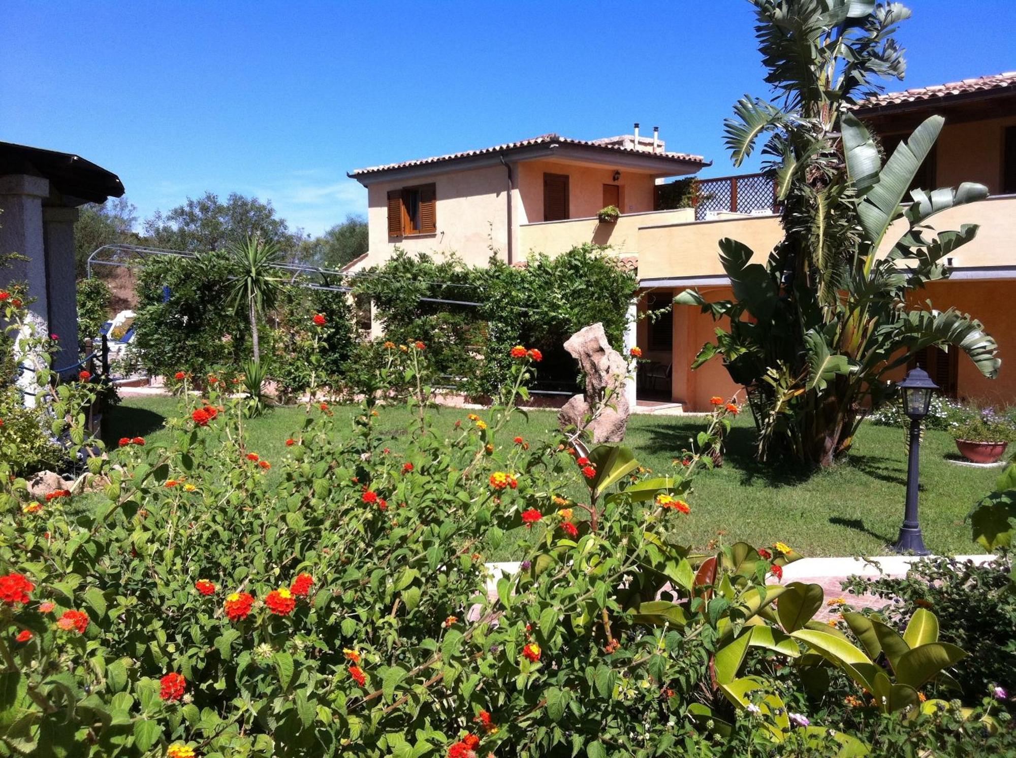 Relais Fenicottero Rosa Pensionat Porto Taverna Eksteriør billede