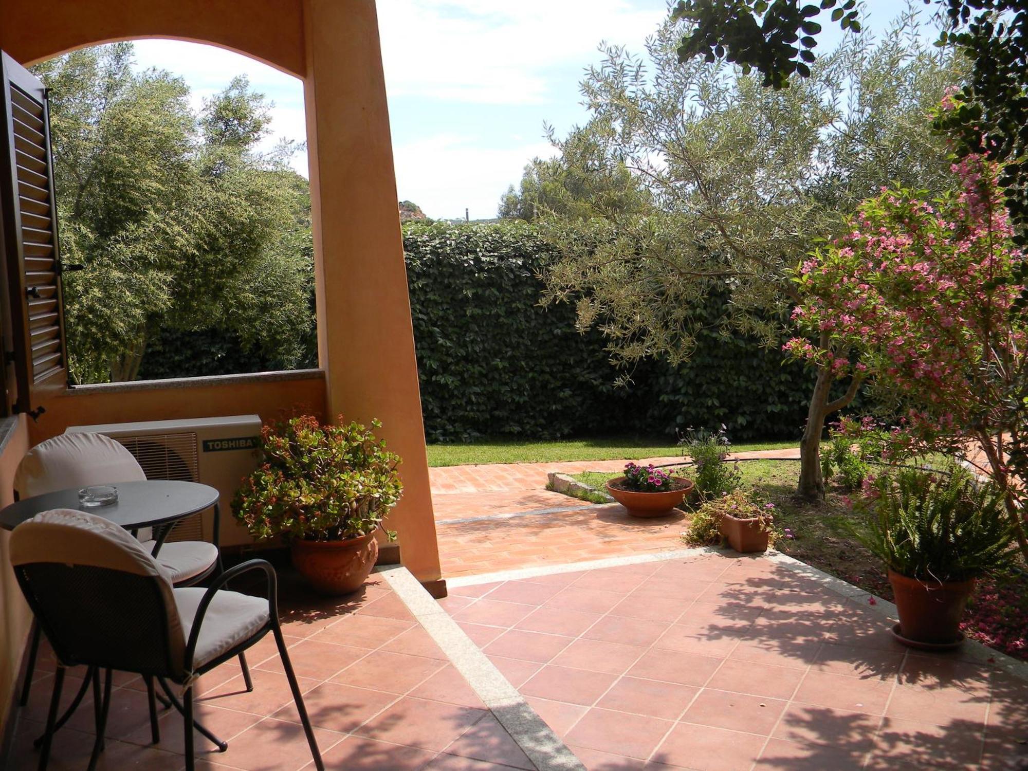 Relais Fenicottero Rosa Pensionat Porto Taverna Eksteriør billede