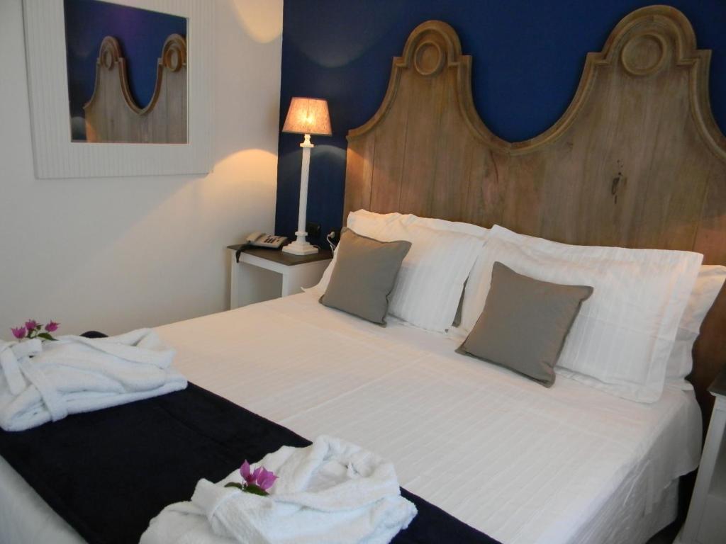 Relais Fenicottero Rosa Pensionat Porto Taverna Eksteriør billede