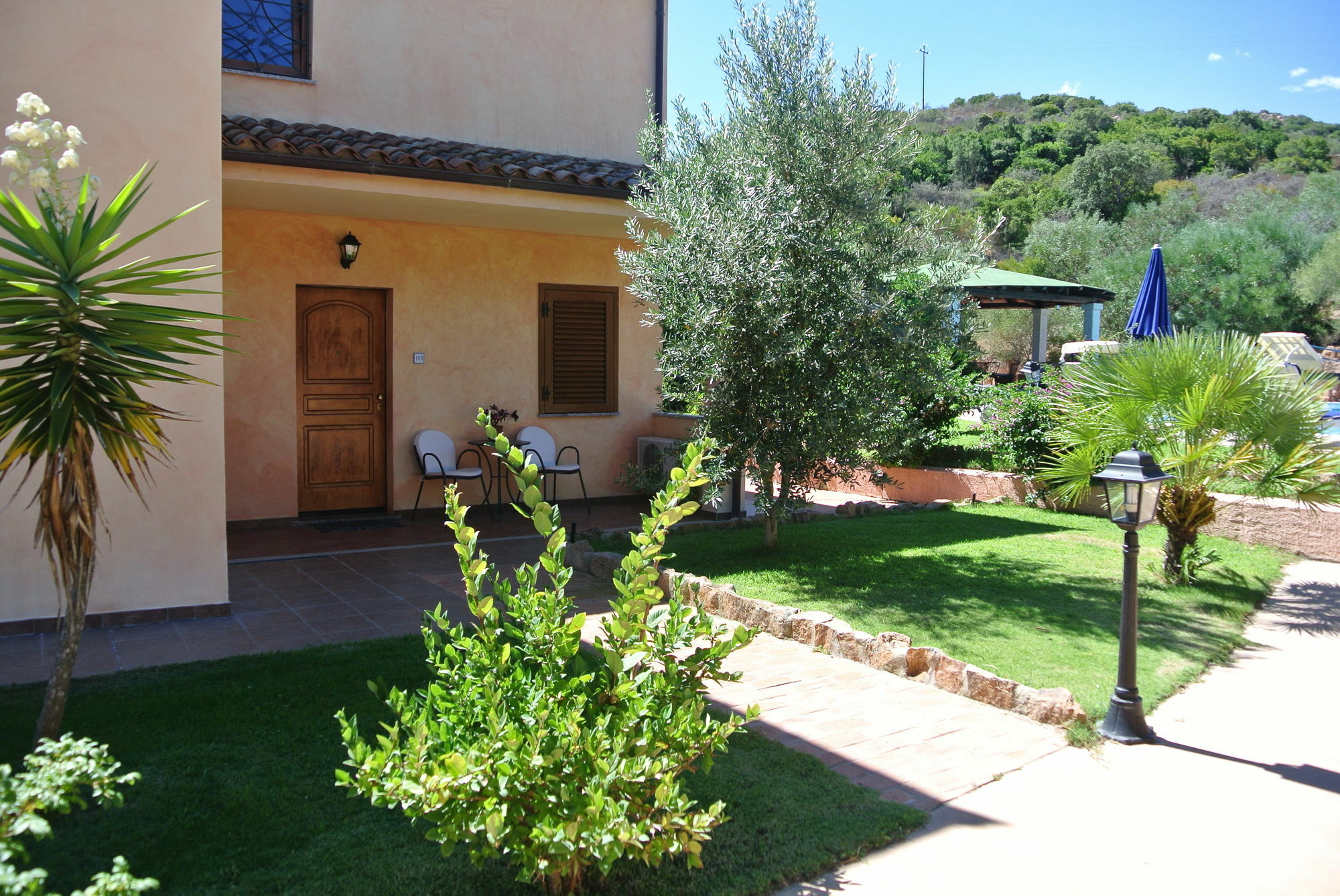 Relais Fenicottero Rosa Pensionat Porto Taverna Eksteriør billede