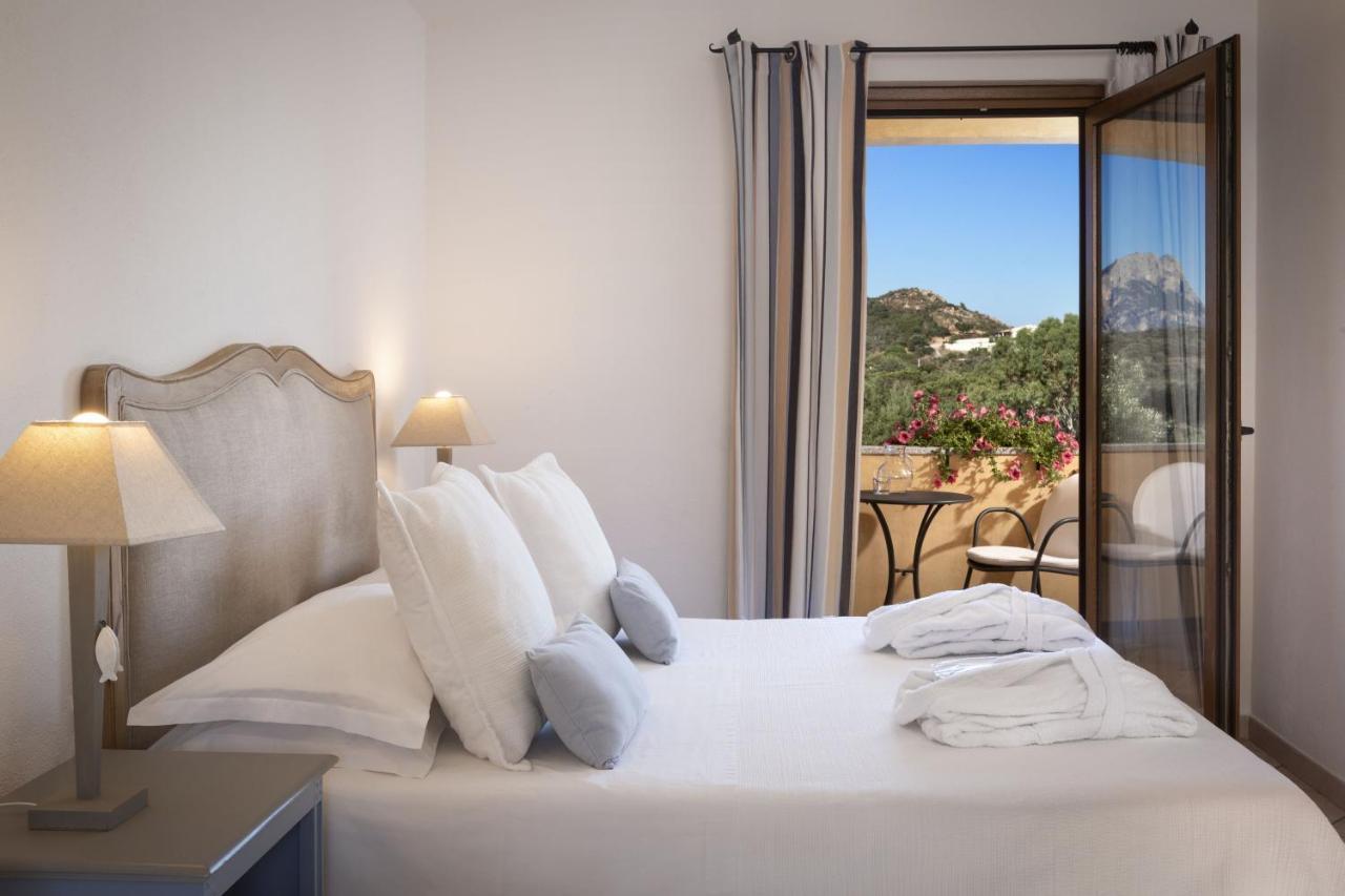 Relais Fenicottero Rosa Pensionat Porto Taverna Eksteriør billede